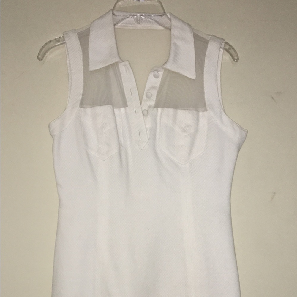 Kenar white pique dress with sheer white fabric.